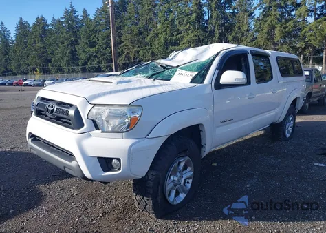 2015 Toyota Tacoma Base V6 z USA, uszkodzony, nr VIN 3TMMU4FN4FM077170